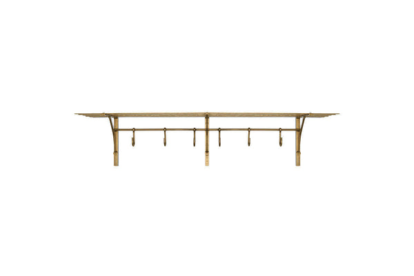 Nkuku Basti antique brass iron storage shelf with six hooks on white background
