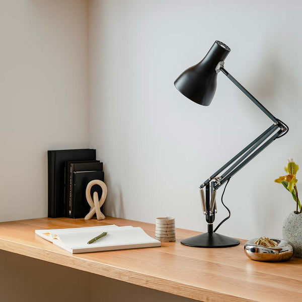 Anglepoise Type 75 desk lamp in jet black on white background