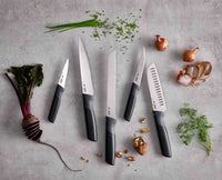Elevate knife resting on its integrated handle rest with blade raised