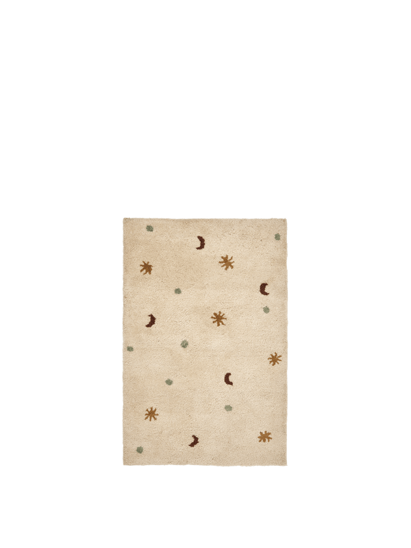 ferm LIVING Skye hand-tufted wool rug in parchment with celestial motif on a neutral background