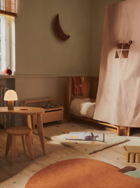 Angled view of the ferm LIVING Skye rug showing its tufted pile