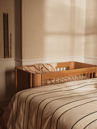ferm LIVING Skye blanket draped in a styled interior