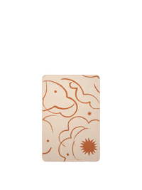 Reverse side of the ferm LIVING Skye blanket showing the solid sienna tone