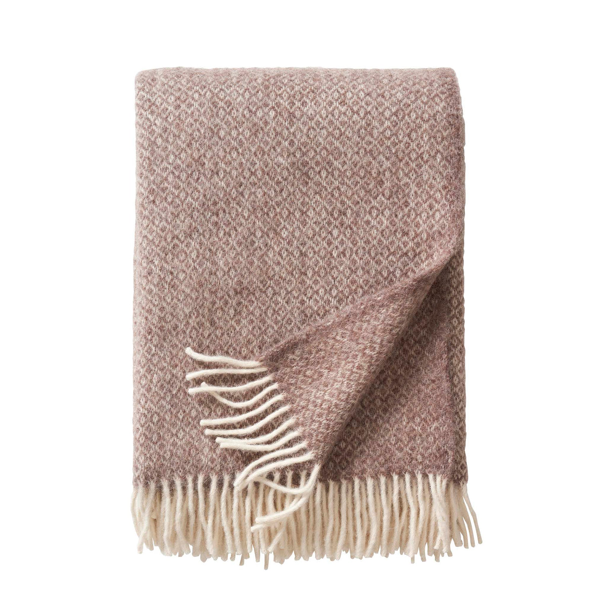 Klippan Lima alpaca and lambswool throw in sand, folded with white fringe on a white background