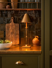 Detail of the Kelmscot lamp's antique brass dome shade