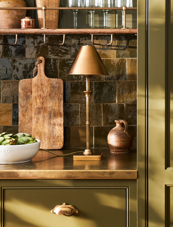 Garden Trading Kelmscot table lamp in antique brass on white background