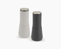 Joseph Joseph Milltop grey salt and pepper mill set on neutral background