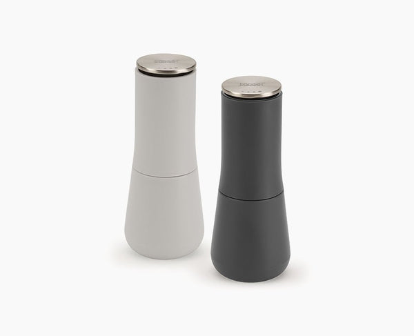 Joseph Joseph Milltop grey salt and pepper mill set on neutral background