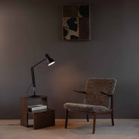 Anglepoise Type 75 jet black lamp on a desk in a home office