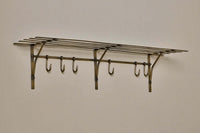 Basti iron shelf mounted on a neutral wall