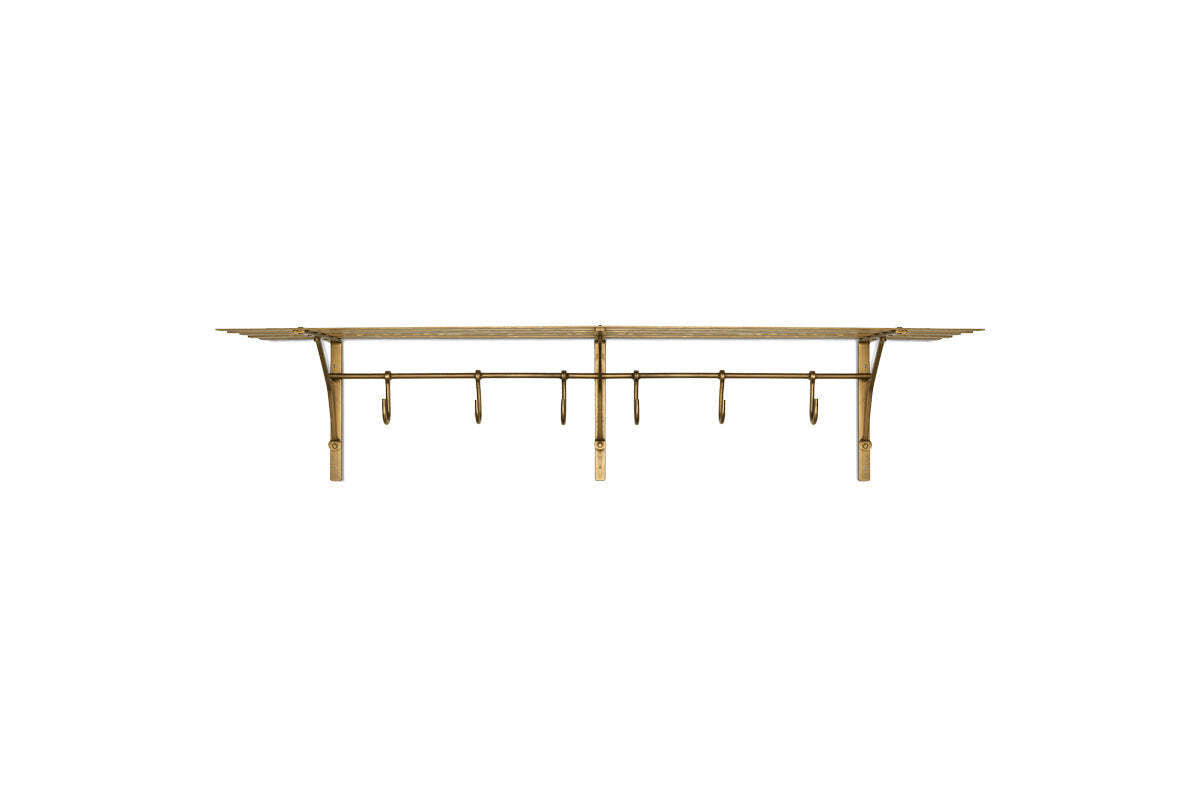 Nkuku Basti antique brass iron storage shelf with six hooks on white background