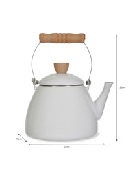 White enamel stove kettle styled on a country kitchen stove