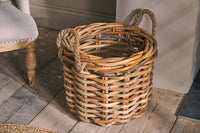 Detail of the chunky rattan weave and rope handle