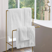 White Christy Supreme Hygro towels styled in a bathroom setting
