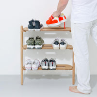 Detail of the Wireworks Heel Bar's oak shelf and hand-sanded edges